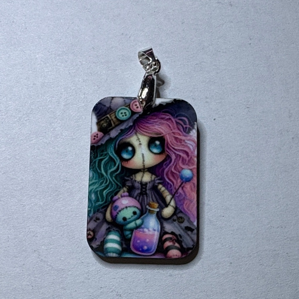 Voodoo doll necklace